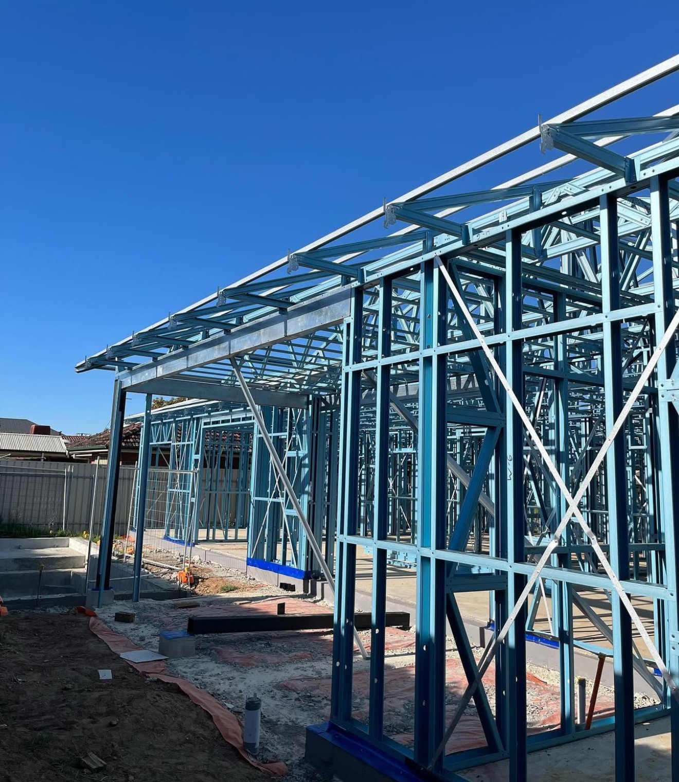 Close-up of a tree stump showing growth rings and a textured brown wood surface.
