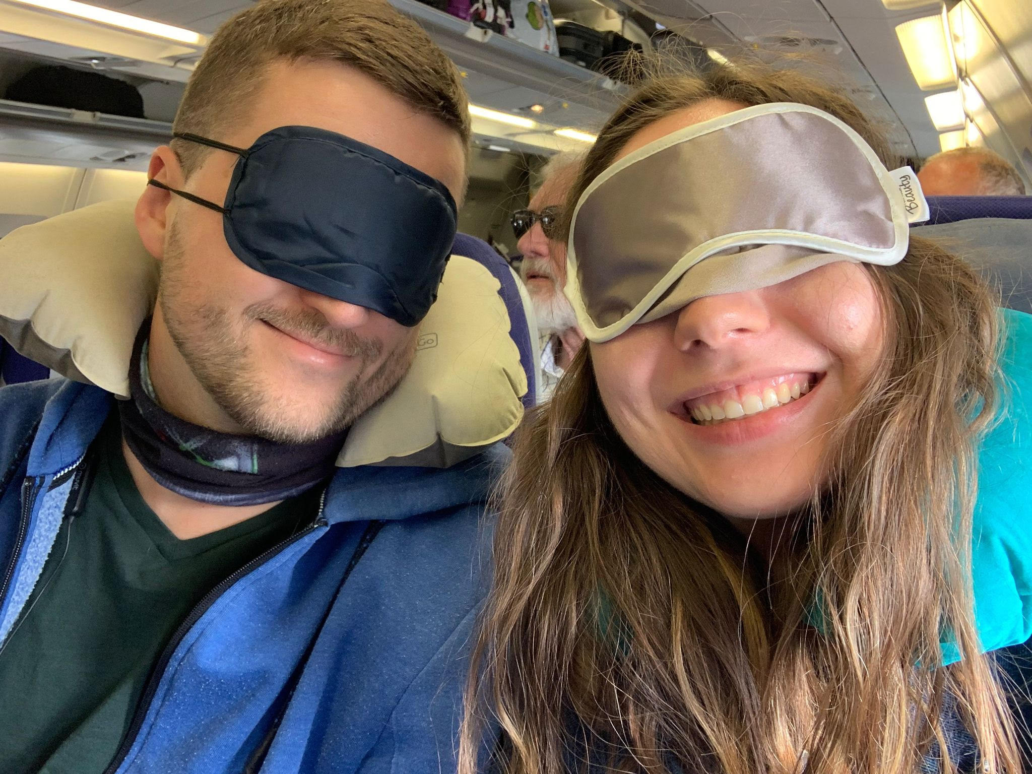 brown wooden picnic table on green grass field during daytime