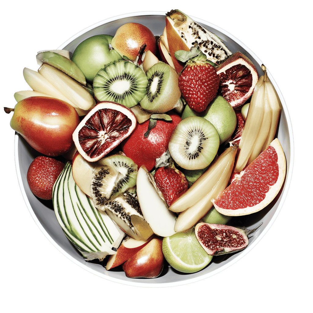 Top view of a vibrant fruit bowl with strawberries, kiwi, apples, bananas, and citrus slices, representing a healthy and colorful diet.