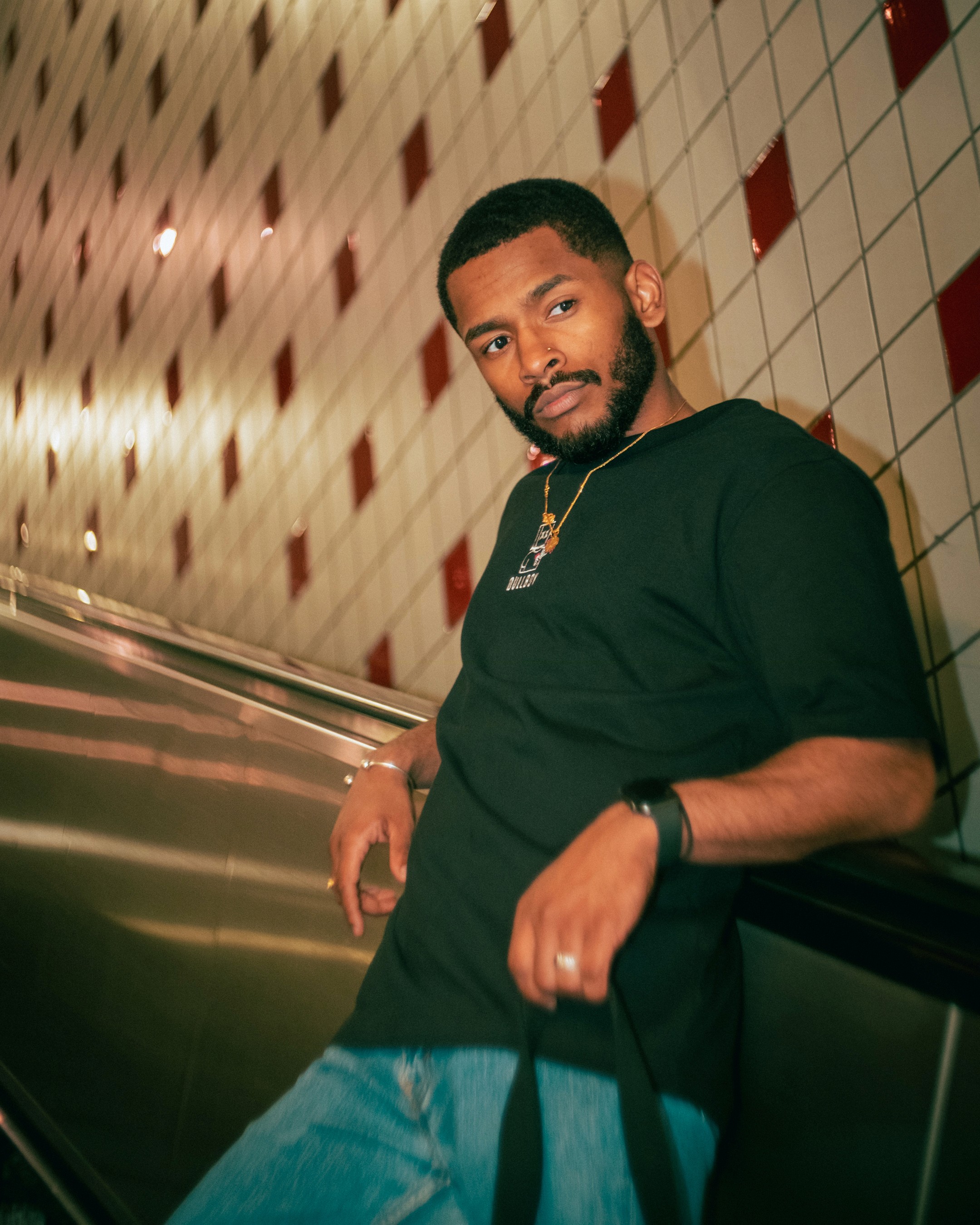 Streetside billboard with flyposters of the Batch.Works brand and illustrations