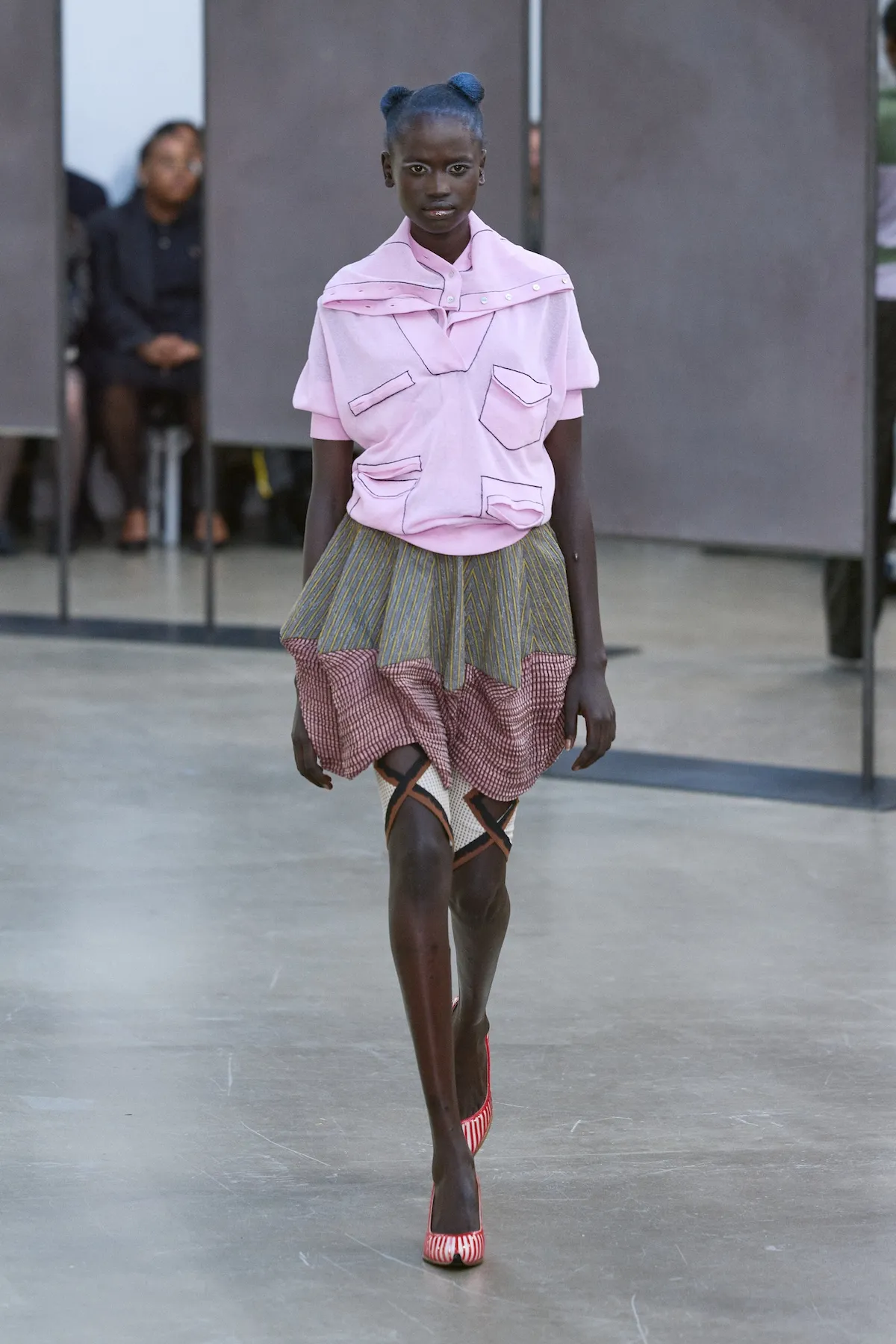 Pink layered look from Kiko Kostadinov spring–summer 2026, archive photograph