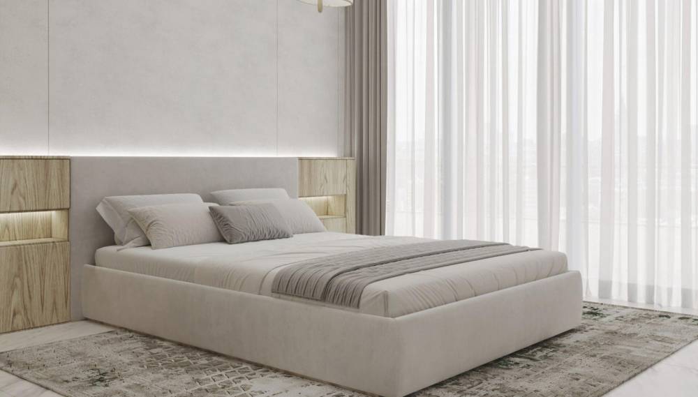 Interior of a contemporary bedroom with a bed and nightstand at Radiant Marina Towers.