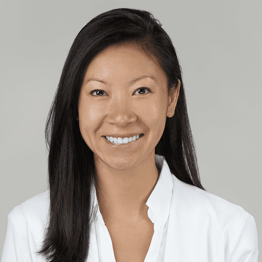 Portrait of Yihan Chen, clinic physician at Biograph, smiling in a professional headshot against a neutral background.