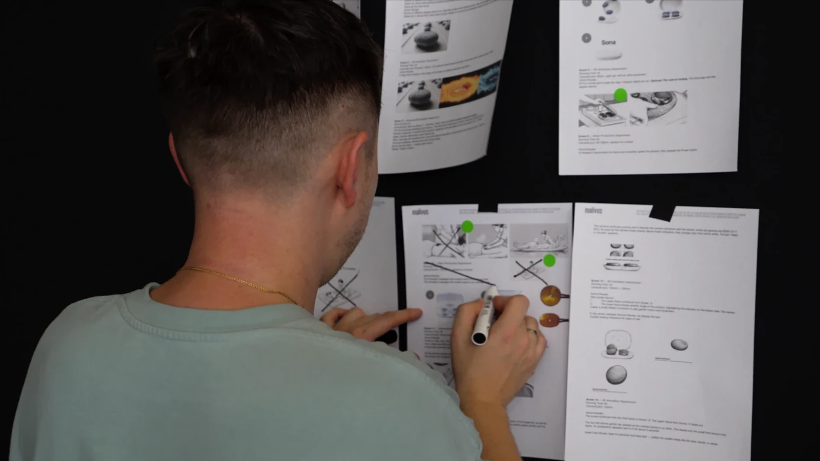 Producer marking up the printed storyboard for the Sona commercial
