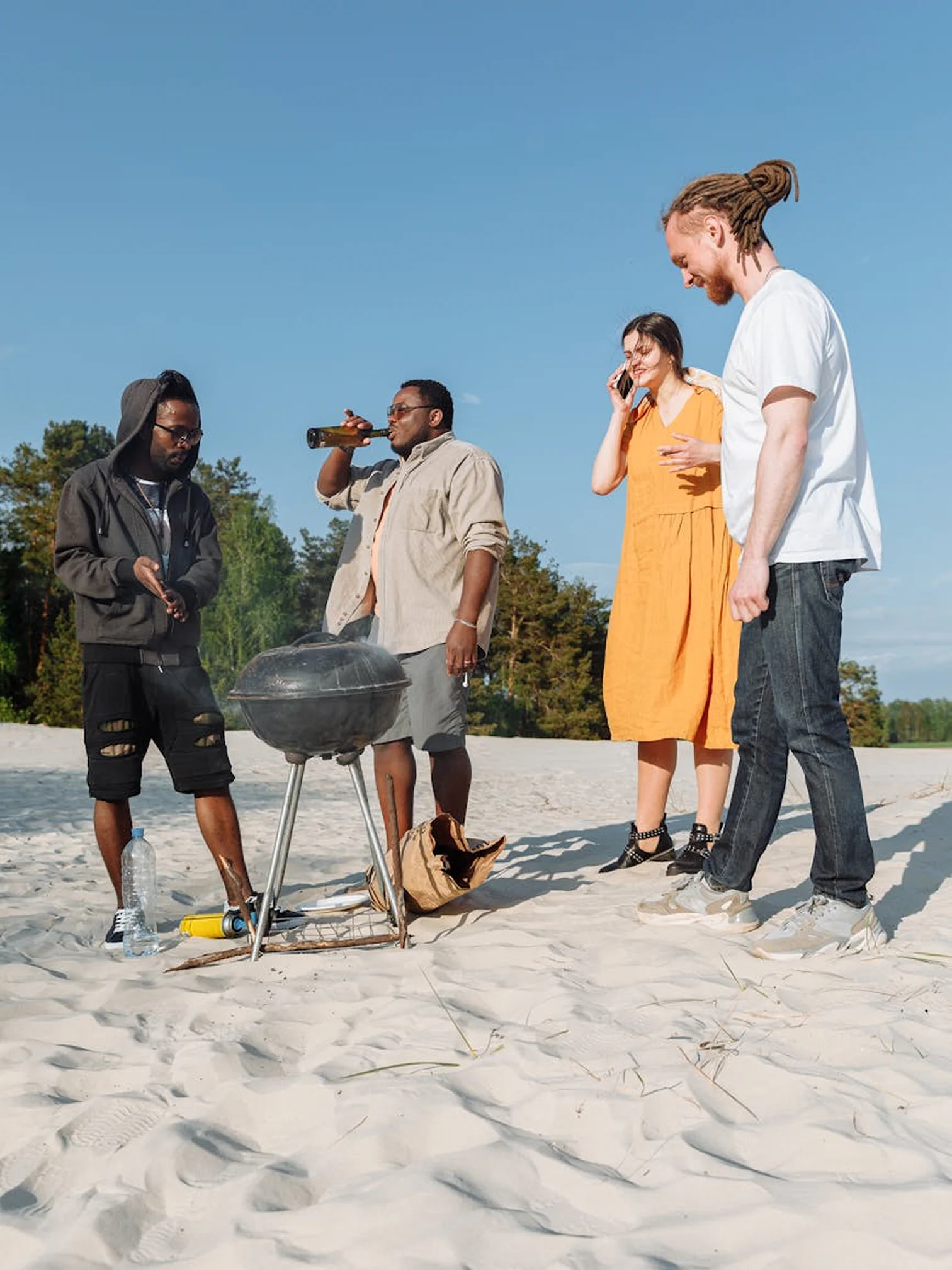 Group of friends enjoying a casual beach resort trip together.
