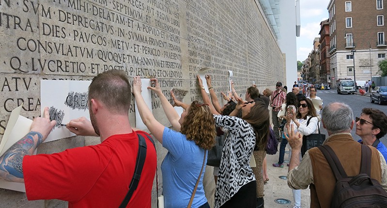 people making frottage on wall