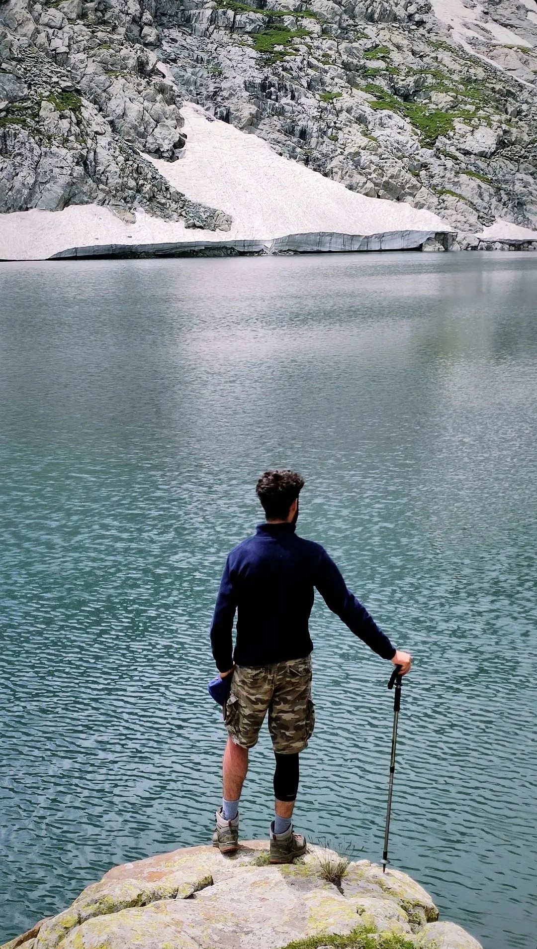 A man with surfboard at beach