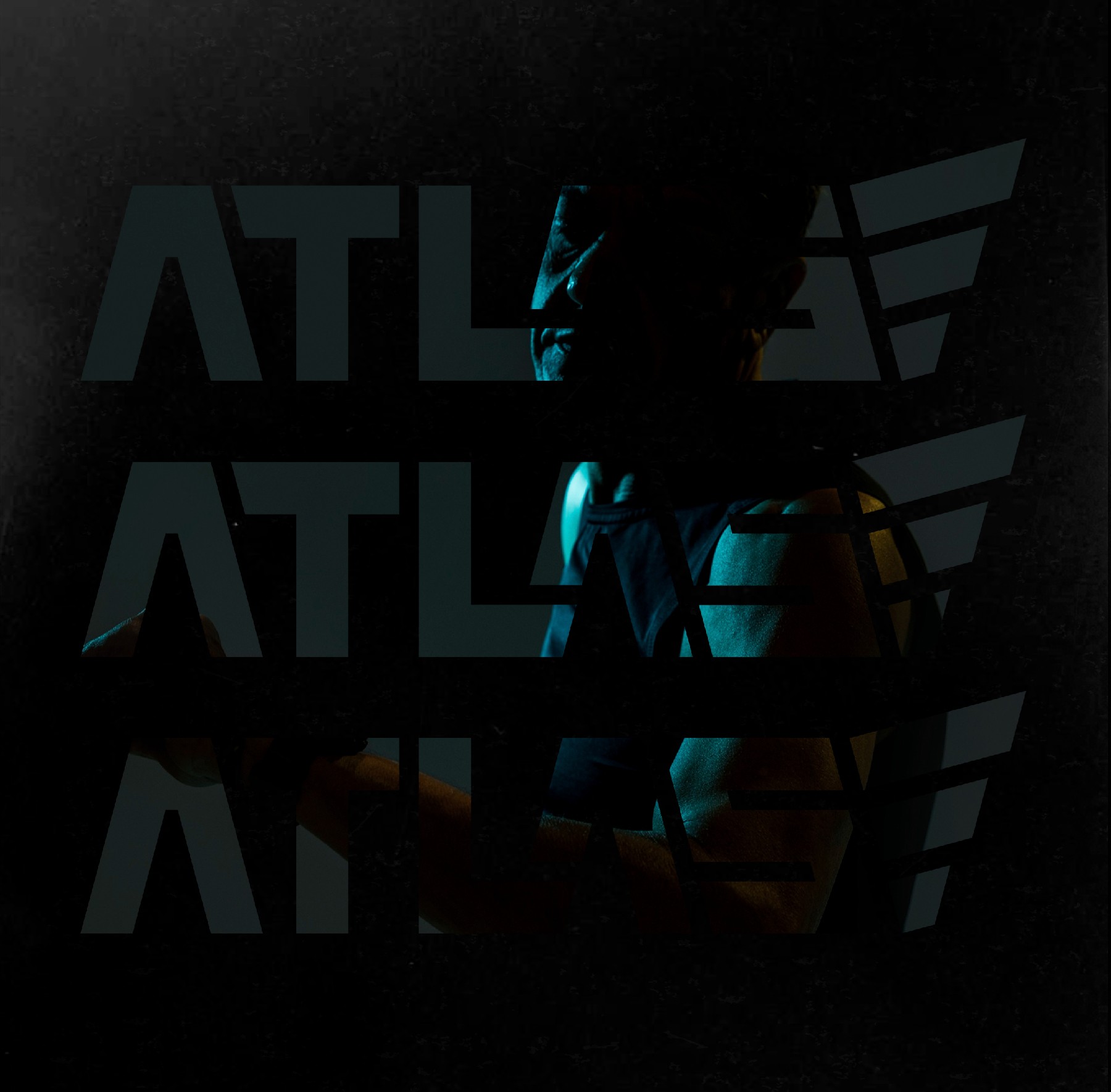 Close-up of a yellow tennis ball sitting on a green court, positioned near the white center line.