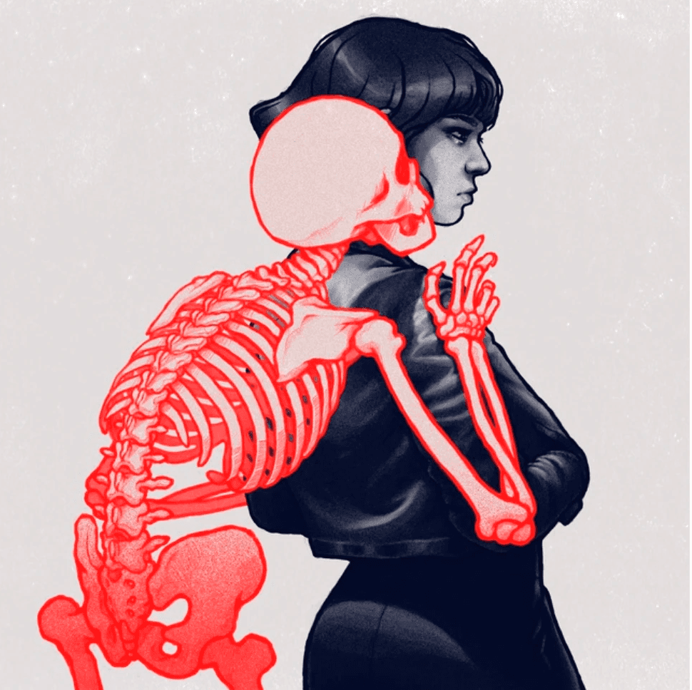 Young woman in colorful robe reads a book.