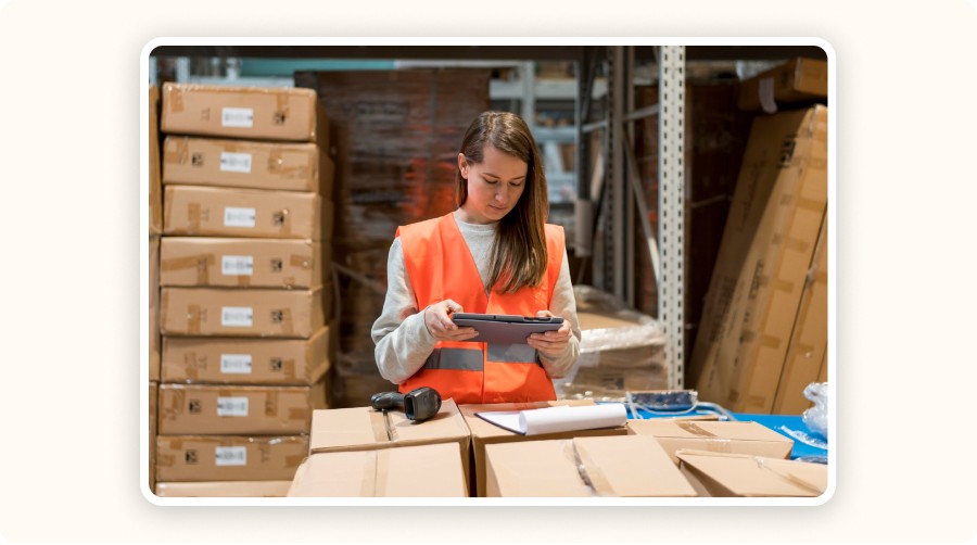 Warehouse employee scanning products