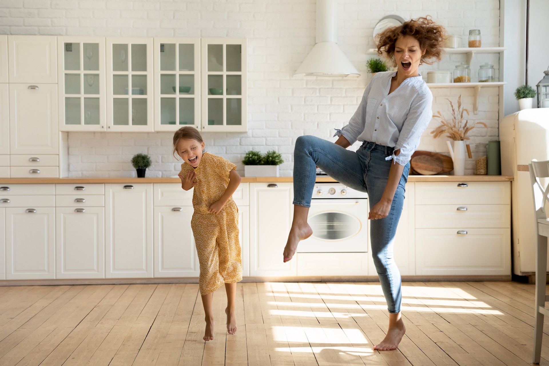 mom and daughter dancing