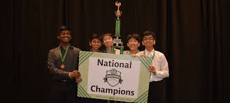 High school students competing in a NAQT quiz bowl tournament, answering academic questions on stage