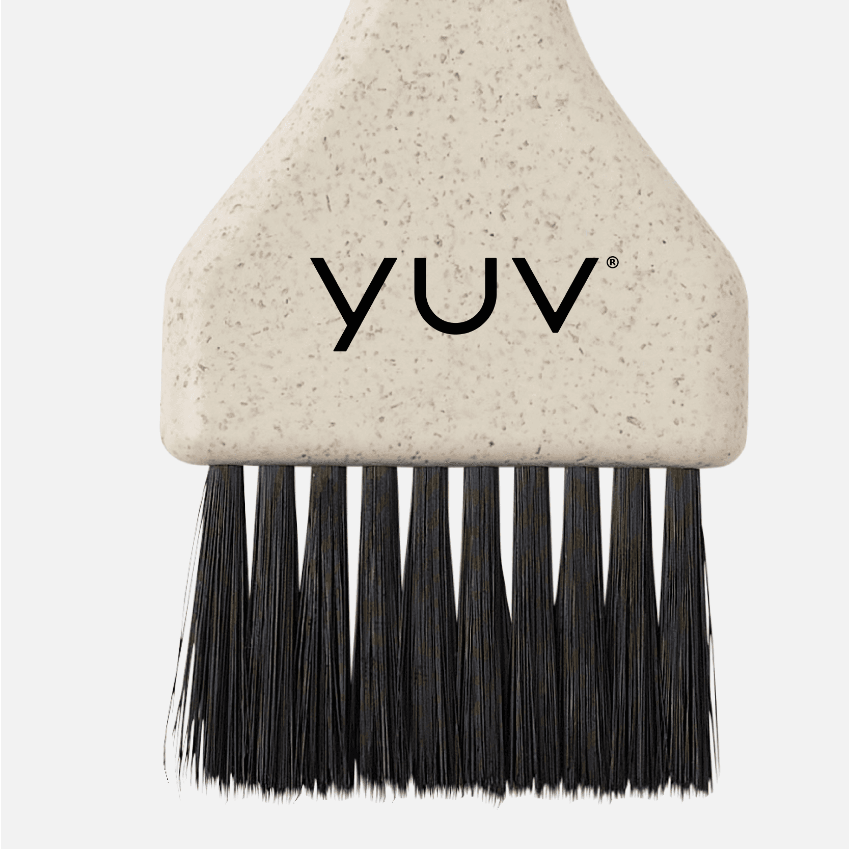 A cropped section showing the yuv® hair colour brush.
