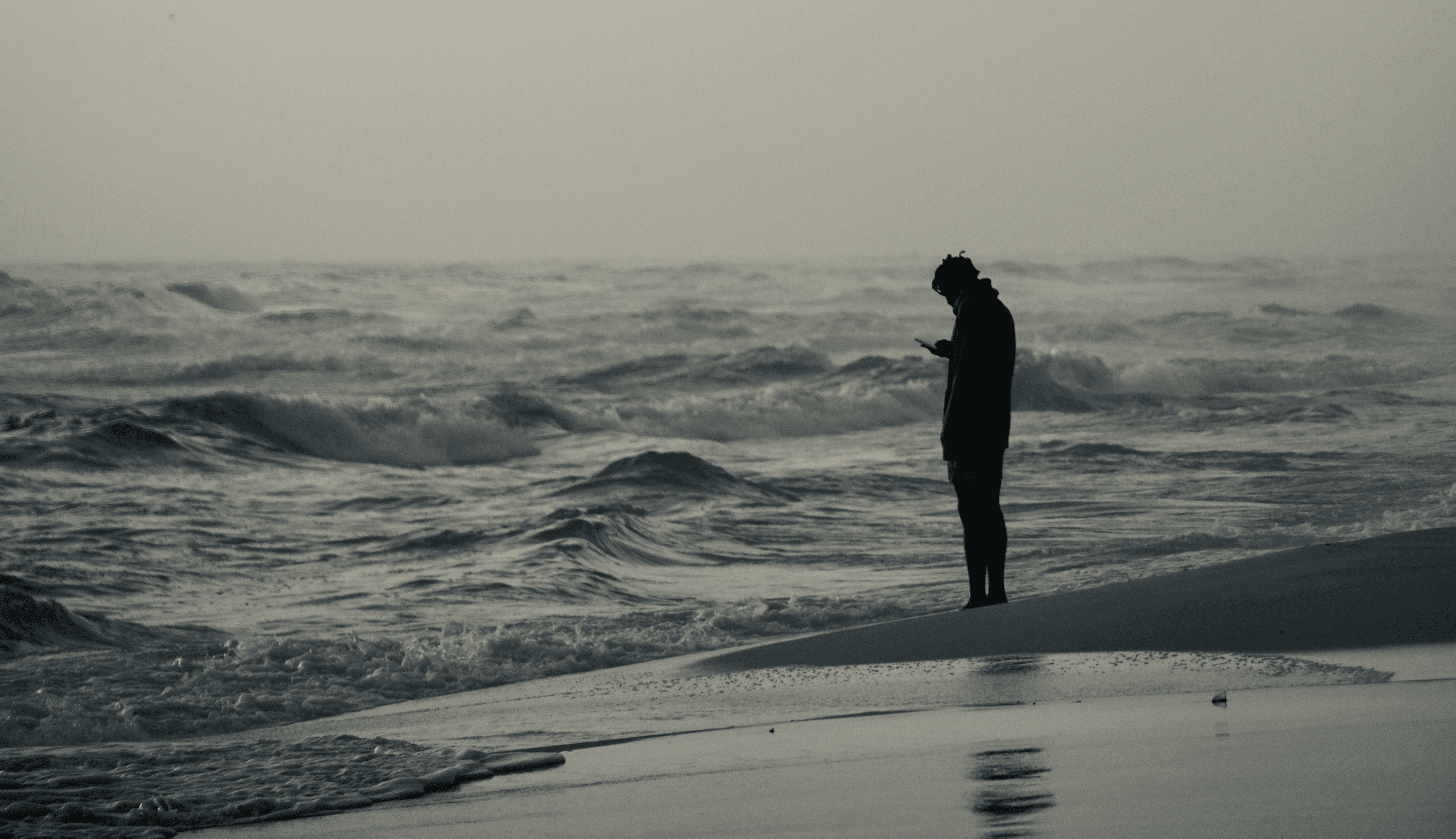 a person standing on a beach