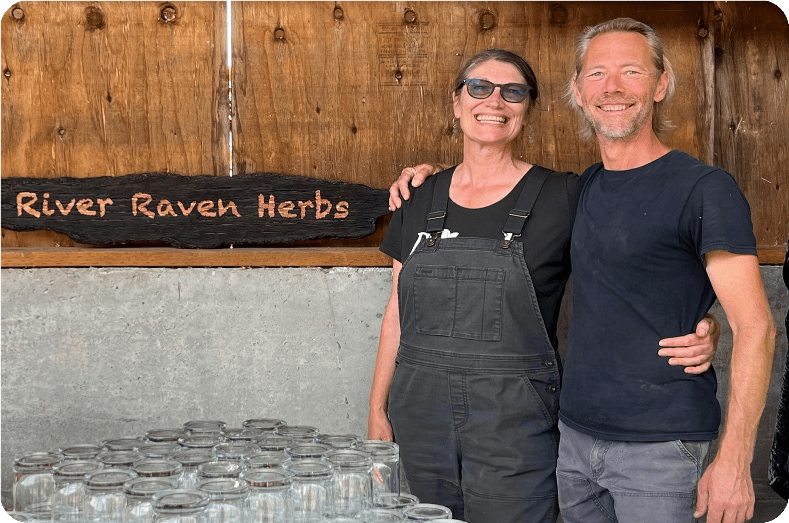 Community members gathered together indoors in conversation during a cohousing meeting.