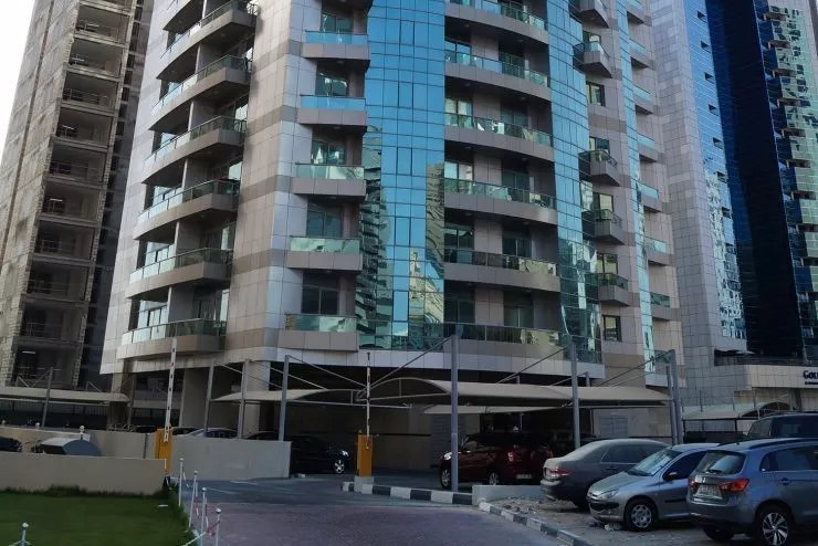 Al Shahed Tower luxury apartments, expertly managed for prime real estate solutions.