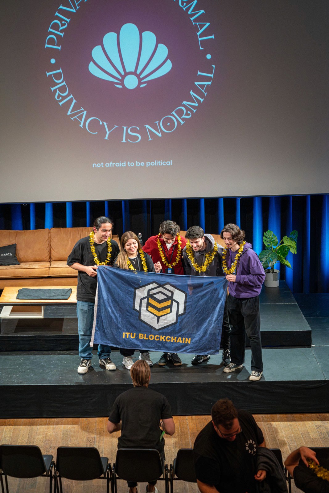 The man looks at the phone