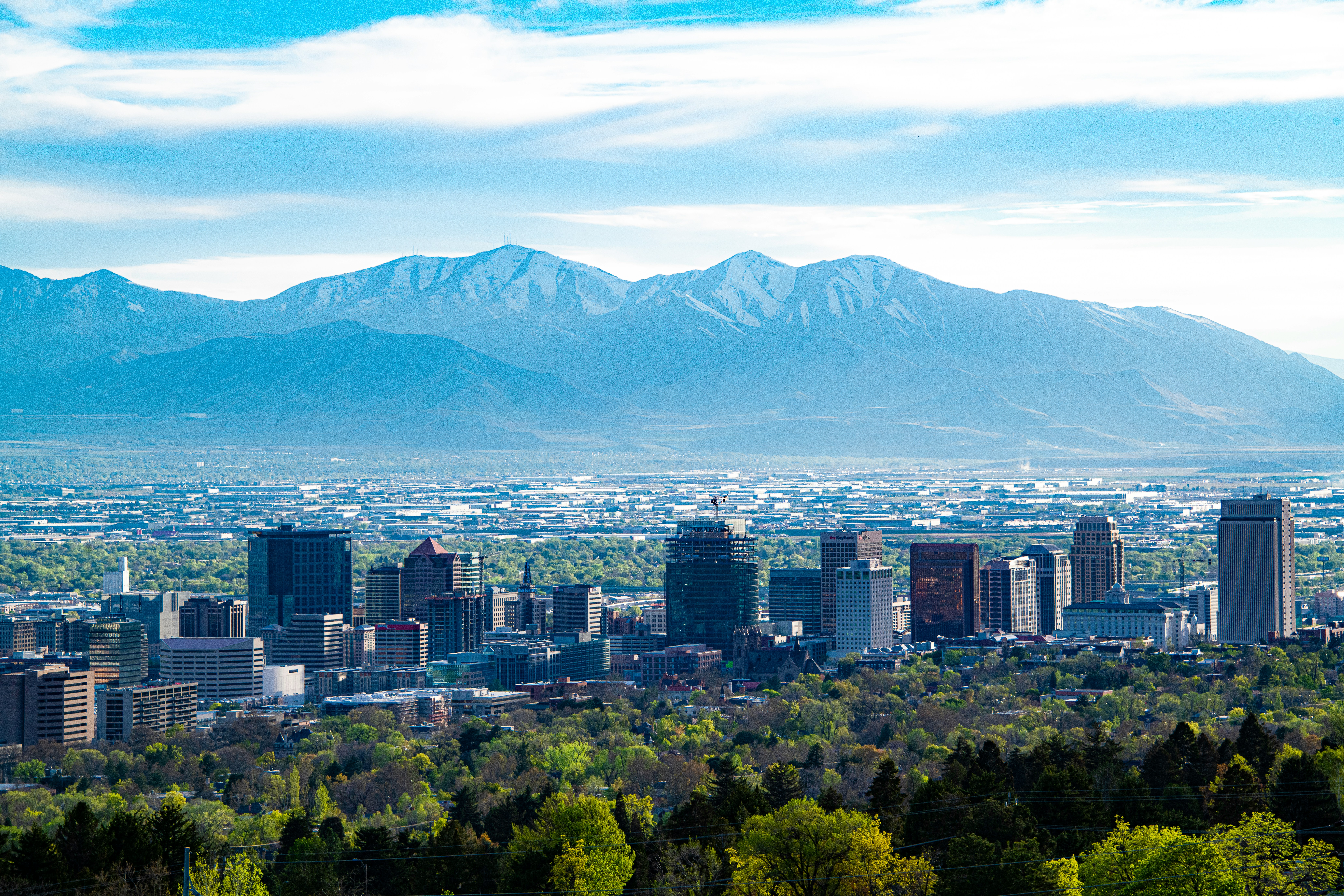 Salt lake skyline with mountains in the back