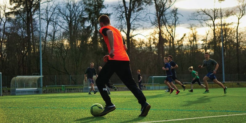 Group playing pickup soccer