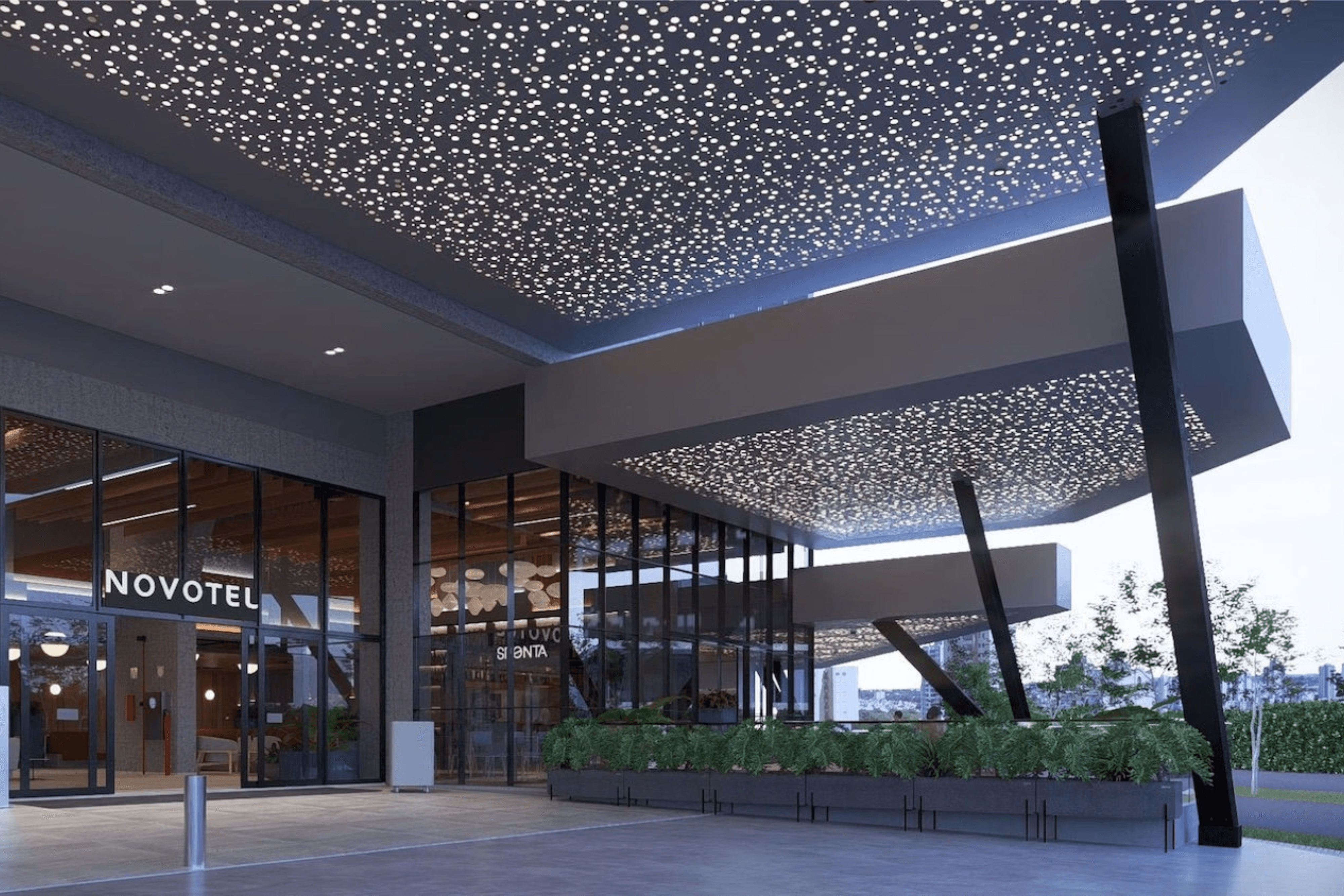 A joyful couple stands back-to-back outdoors.