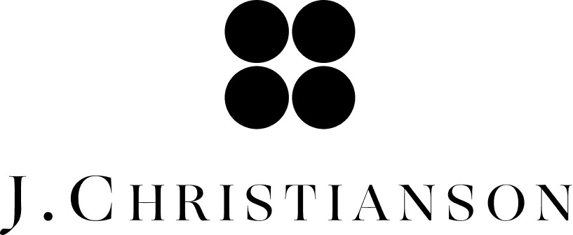 Neiman Marcus editorial featuring woman in elegant dark textured jacket showcasing classic beauty and sculptural fashion