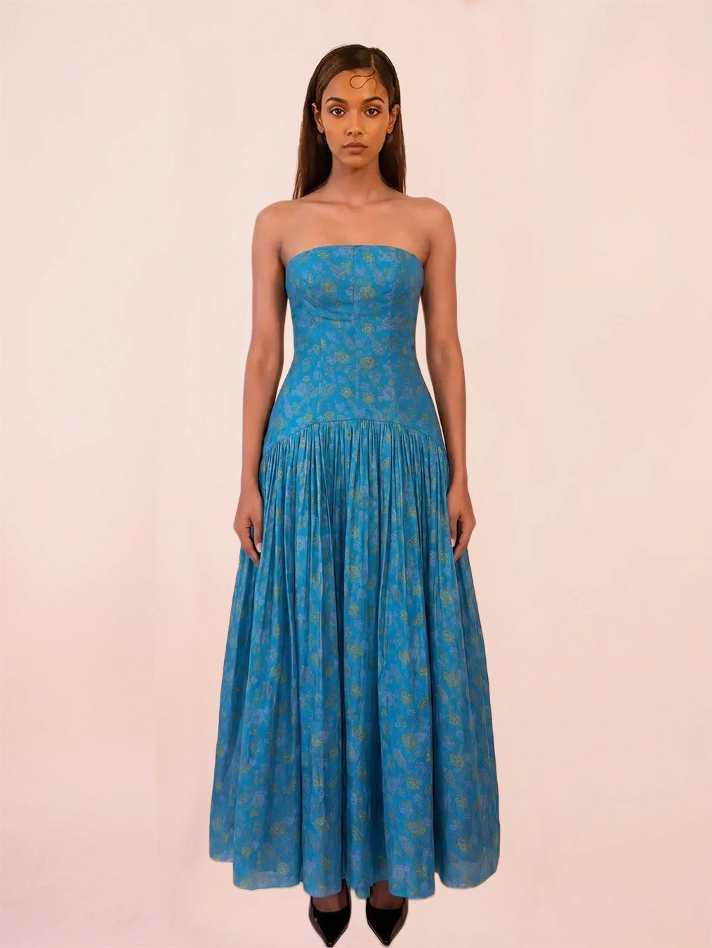 NOOR IV is our one-of-a-kind orange printed silk drop-waist dress, handcrafted by skilled artisans in-house using a one-of-a-kind vintage silk saree