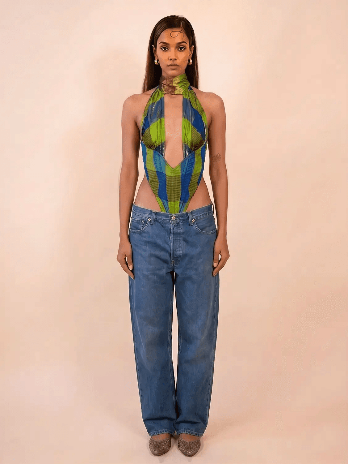 VIVIENNE is our one-of-a-kind printed silk tube corset, handcrafted in-house using a vintage silk saree. 