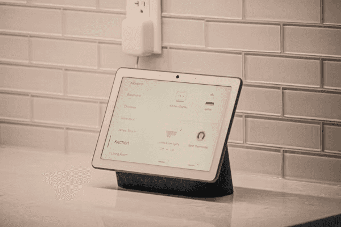 A modern smart home living room with AI-connected devices — speaker, lights, and camera