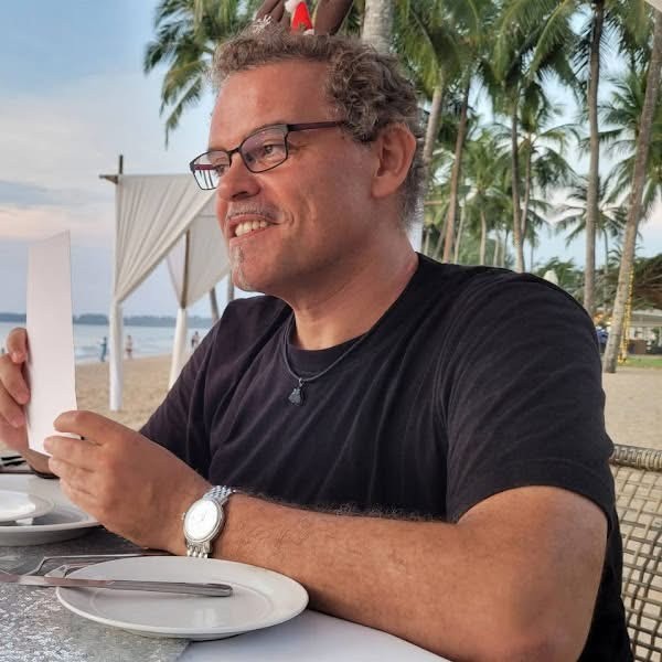 person holding kettle cooked potato chips