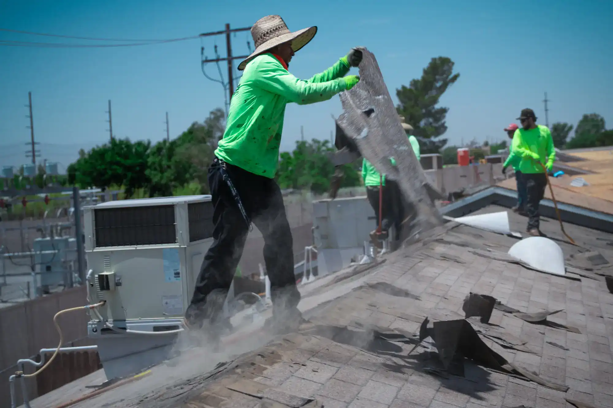 Roofer installing a flat roof system