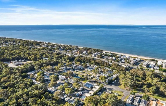 Aerial drone view of Bribie Island coastal peninsula in the Moreton Bay region serviced by ONF Surveyors