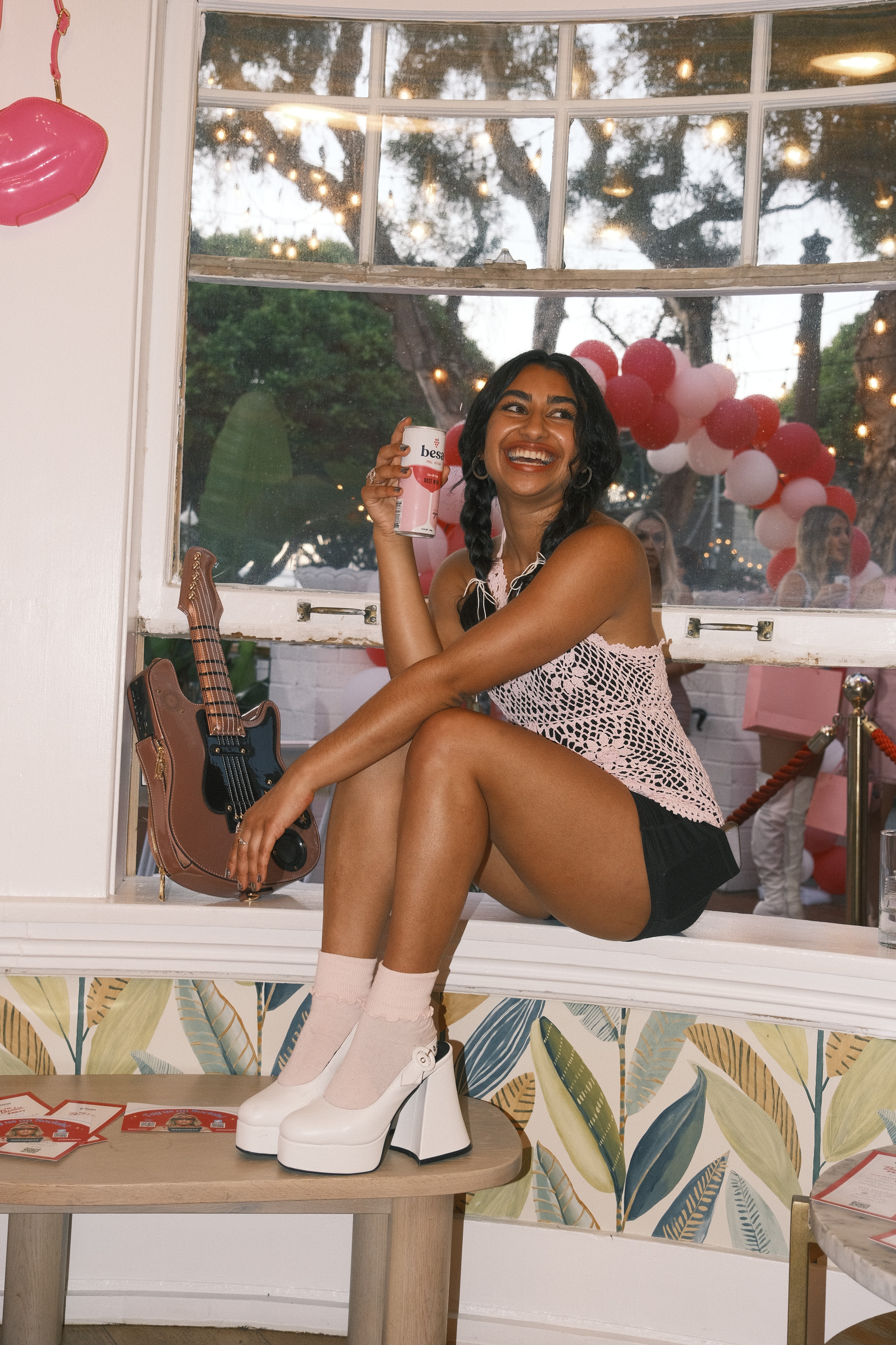 ladies with cans of hard seltzer