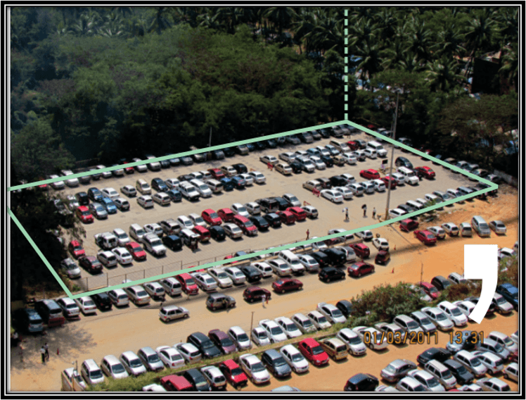 man in black suit jacket holding white ceramic mug
