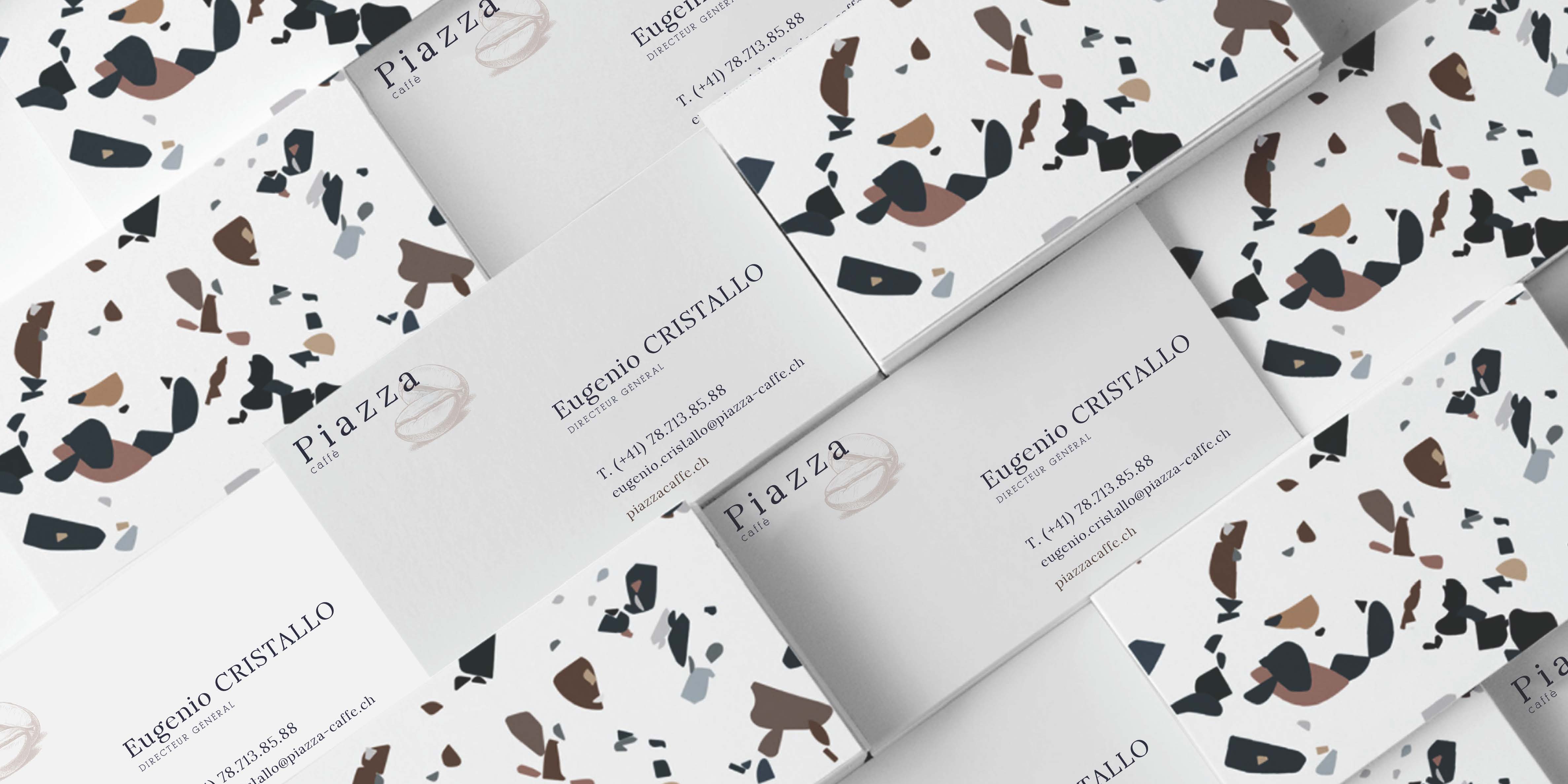 Piazza coffee business cards on terrazzo surface