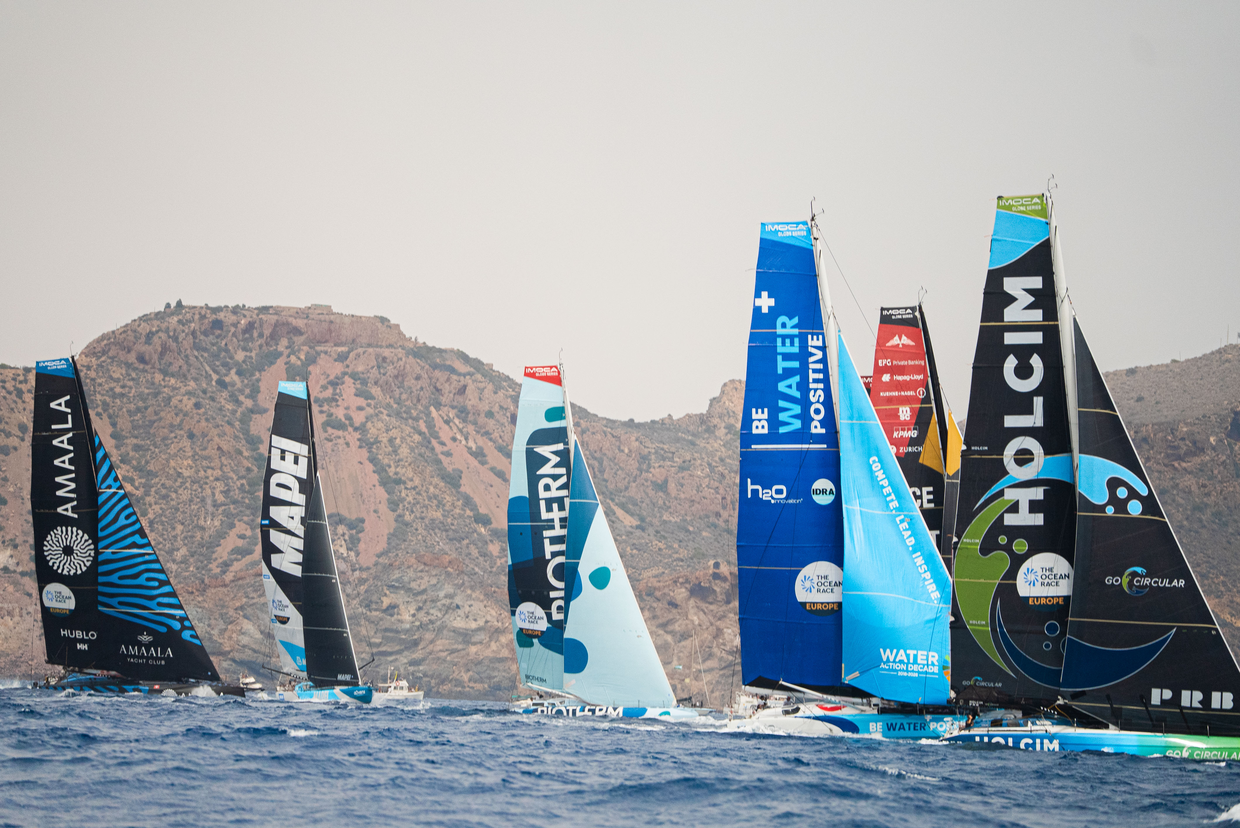 A man wearing a virtual reality headset, immersed in a digital experience, with a focused expression on her face.