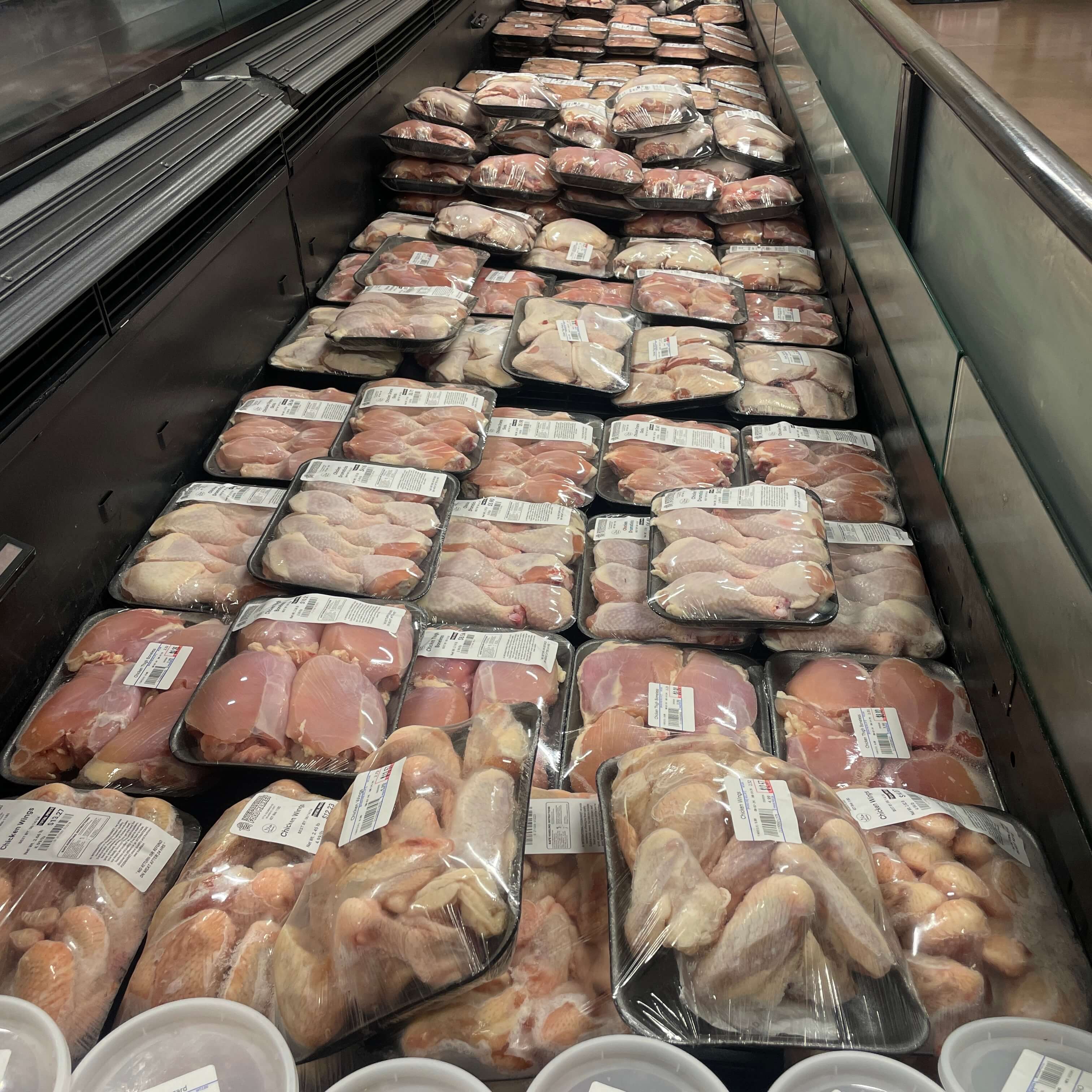 Variety of fresh chicken cuts available at International Food Market Orlando.