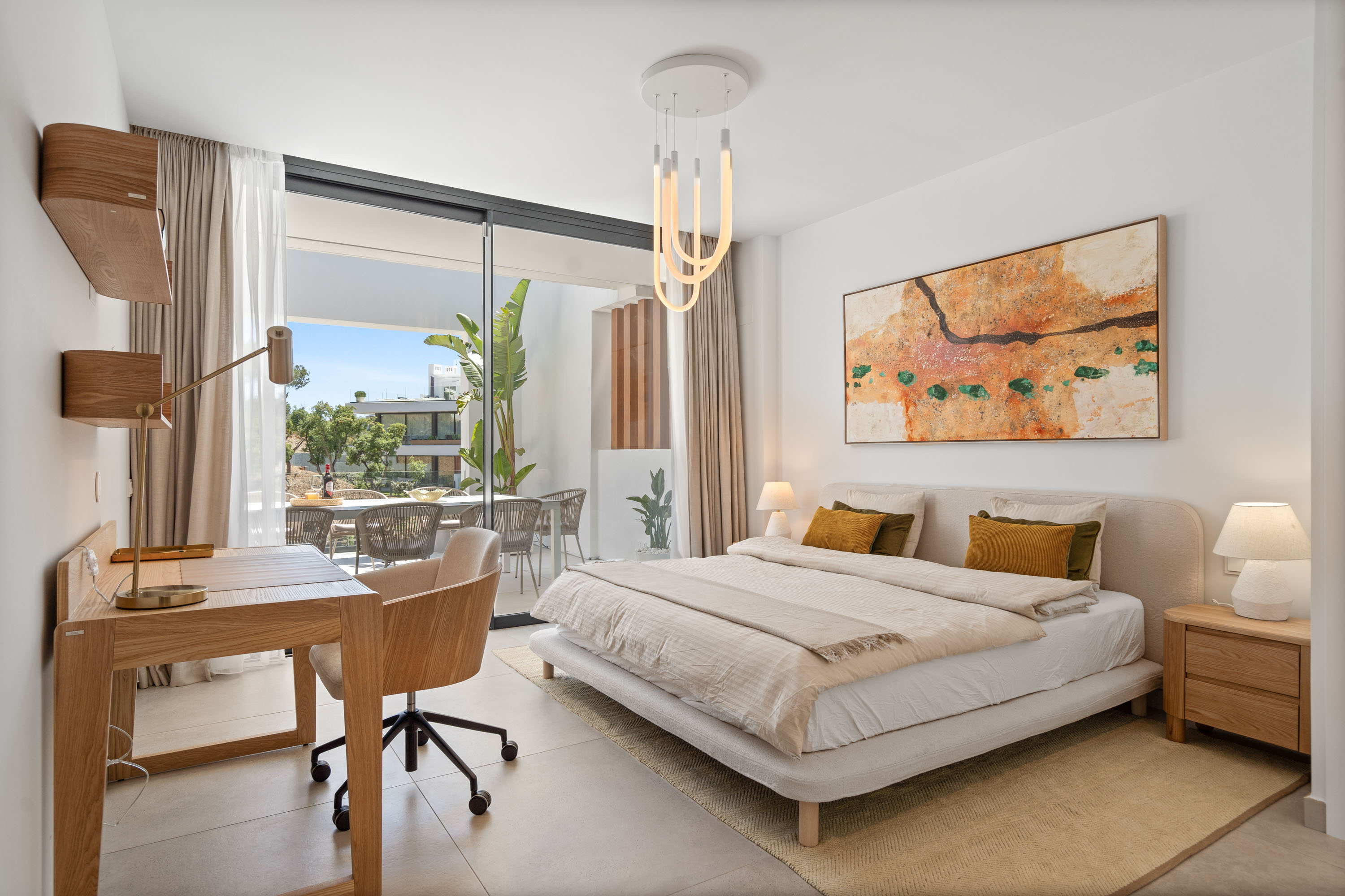 marbella 2 bedroom apartment with large comfortable bed and terrace