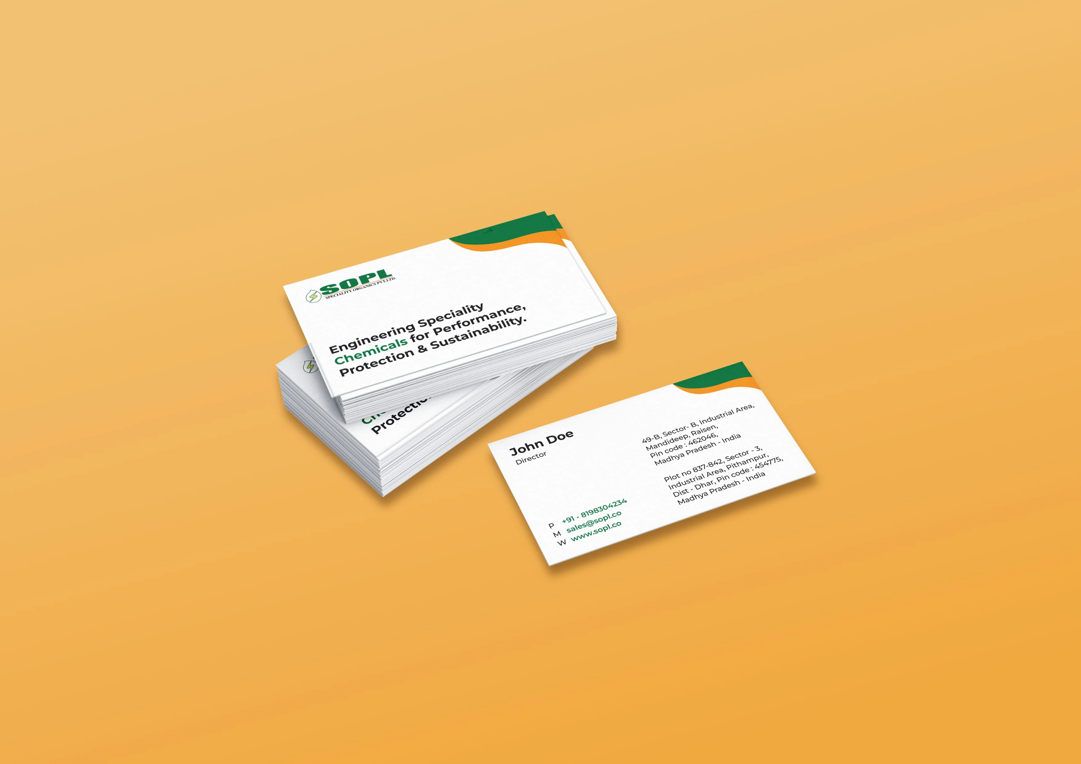 Stack of professional business cards with green accents and insurance text beside a single card on a warm orange background, conveying trust.