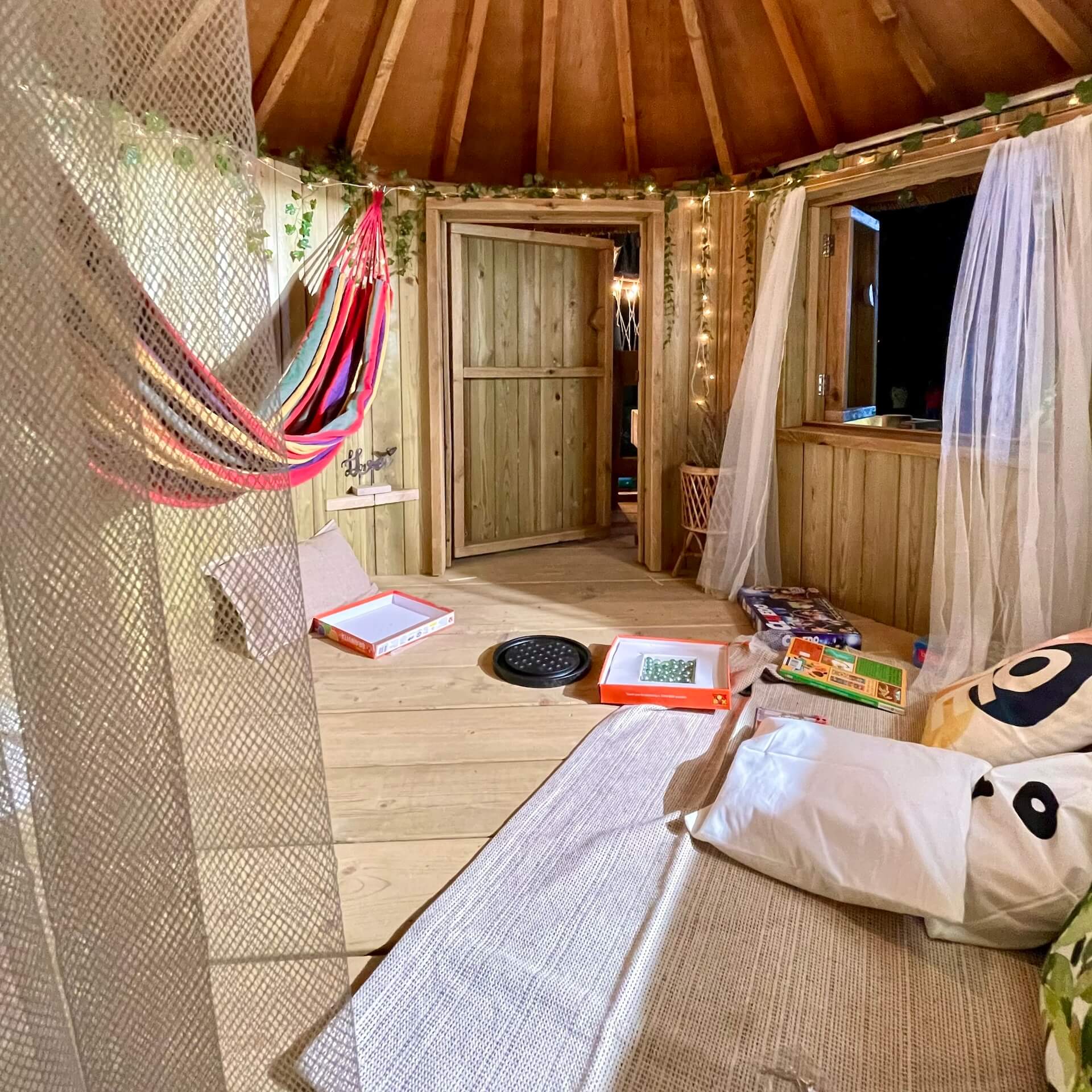 Streetside billboard with flyposters of the Batch.Works brand and illustrations