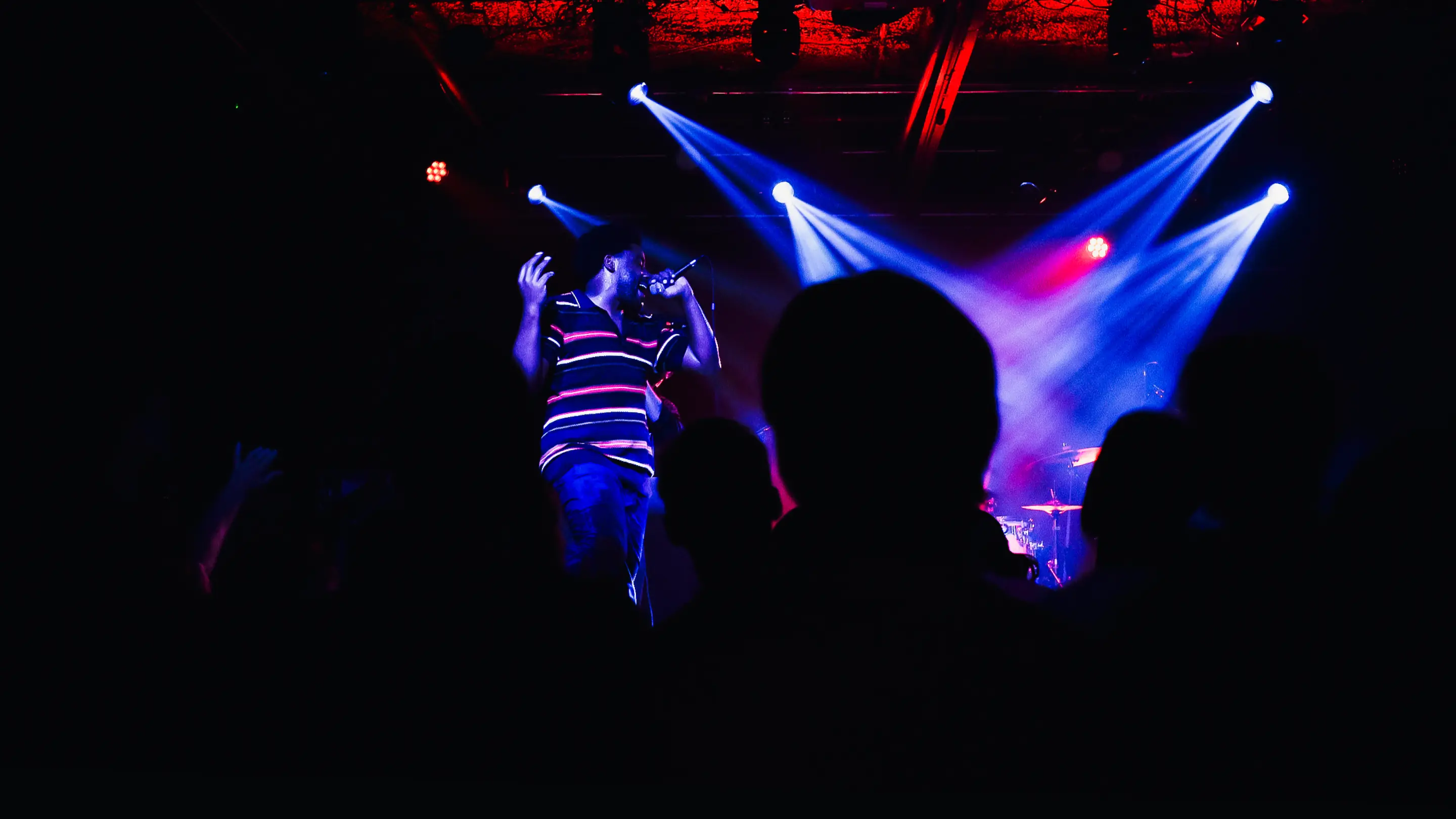 BlackLight Hip Hop — Hero photo of BlackLight performing live — Concert branding for Netflix Queer Eye