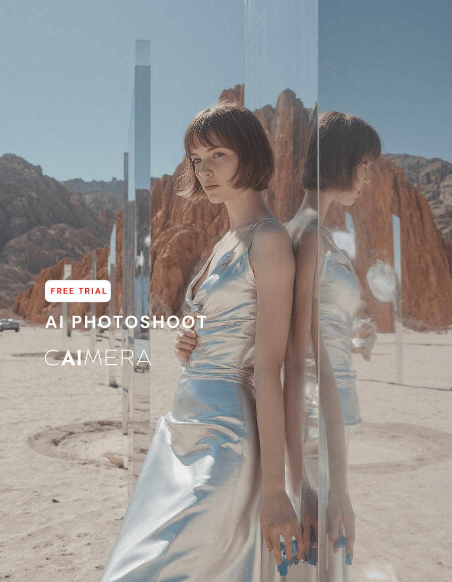 Artistic desert scene with person in silver dress standing beside reflective mirror panels with dramatic red rock formations in background