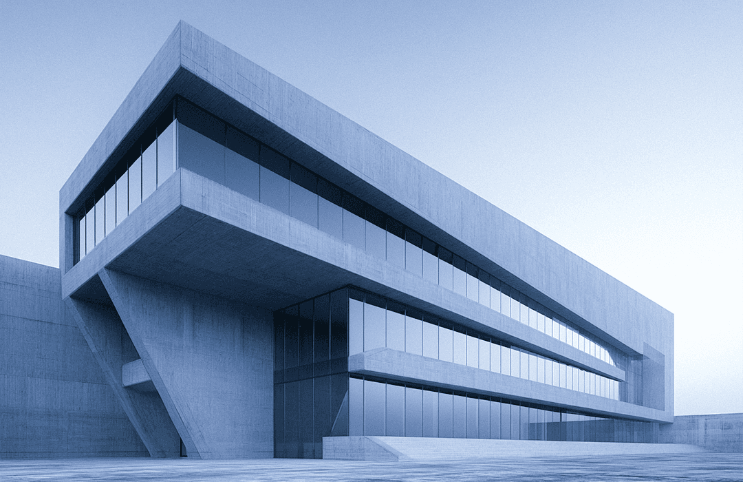 Fachada lateral de prédio comercial moderno com arquitetura minimalista em concreto e vidro.