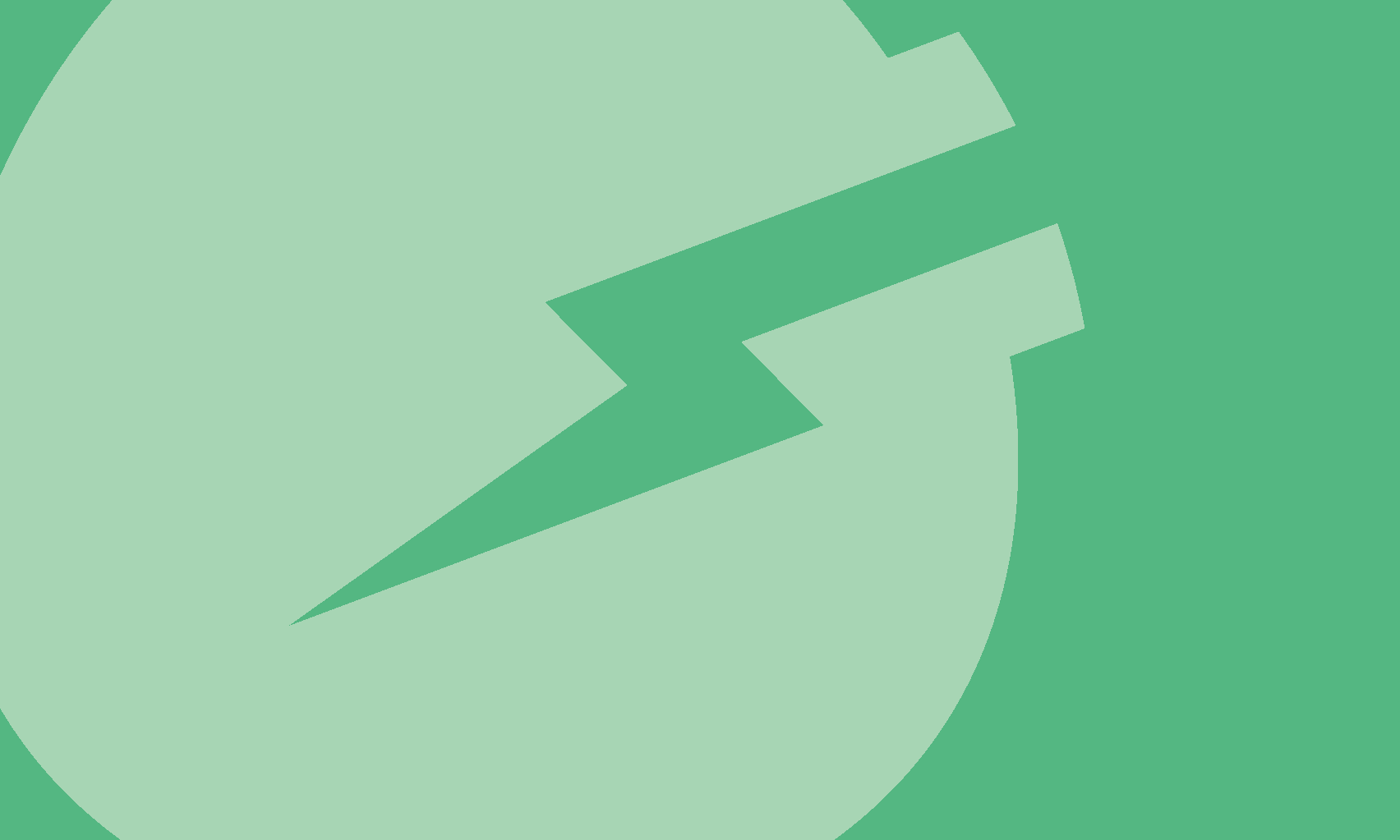 People relaxing in a sunlit lobby with large windows