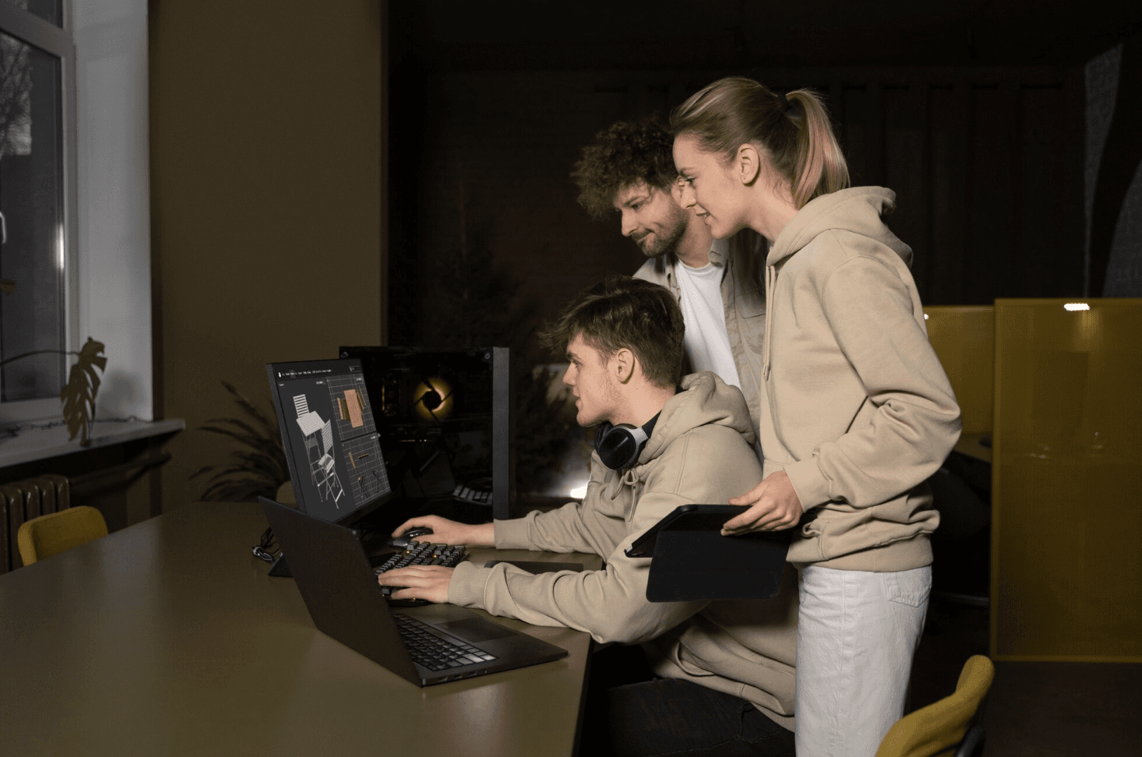 Two Men Using Laptop
