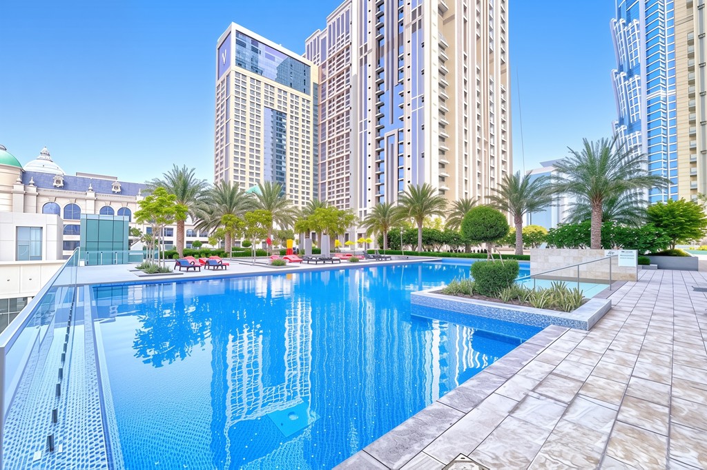 The scene depicts two towers side by side, prominently including Noora Tower.