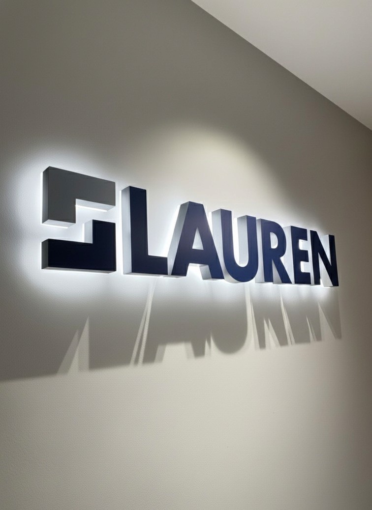 Installed 3D printed wall-mounted logo sign for Lauren Engineering, fabricated by DisplayWorks in Calgary.