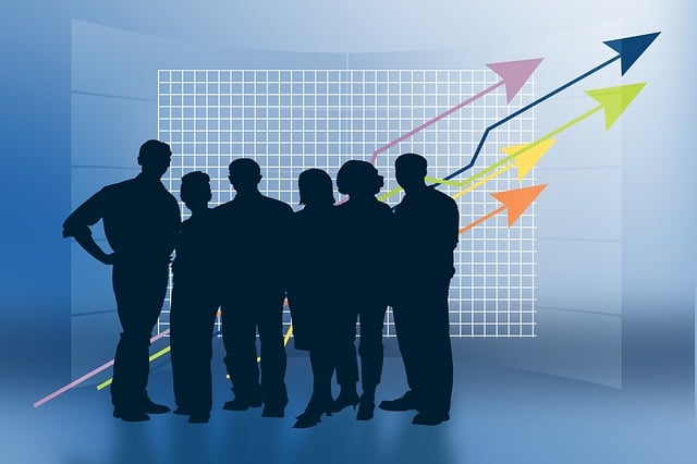 person sitting in a chair in front of a man