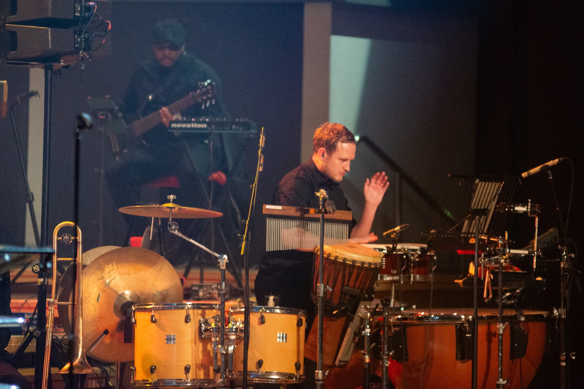 Drummer playing a drum set on stage