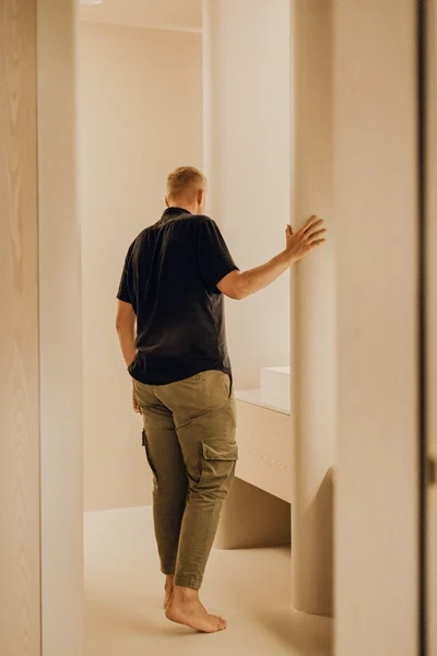 Man walking in to the bathroom
