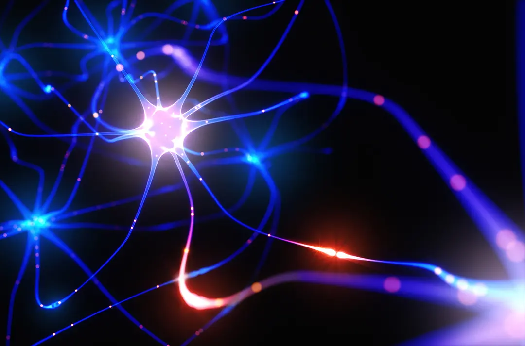 Glowing neuron synapse firing illustrating brain activity and neural pathway formation